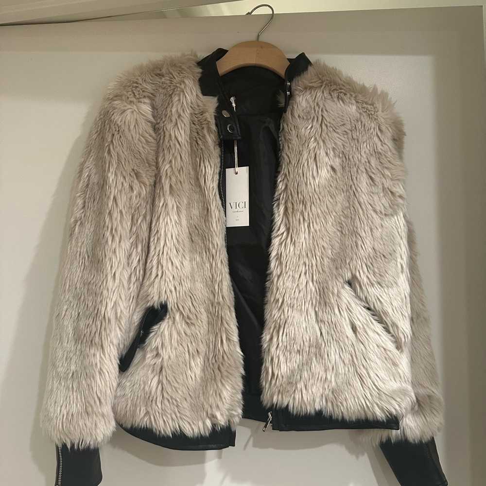 Faux fur and leather jacket in brand new condition size small
